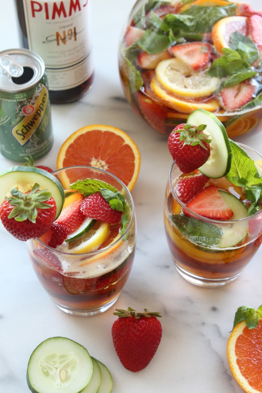 Strawberry Pimm's Cup with Citrus, Cucumber, & Mint | alwayseatdessert.com