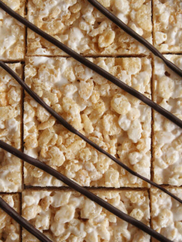 overhead view of Rice Krispies treats drizzled with chocolate
