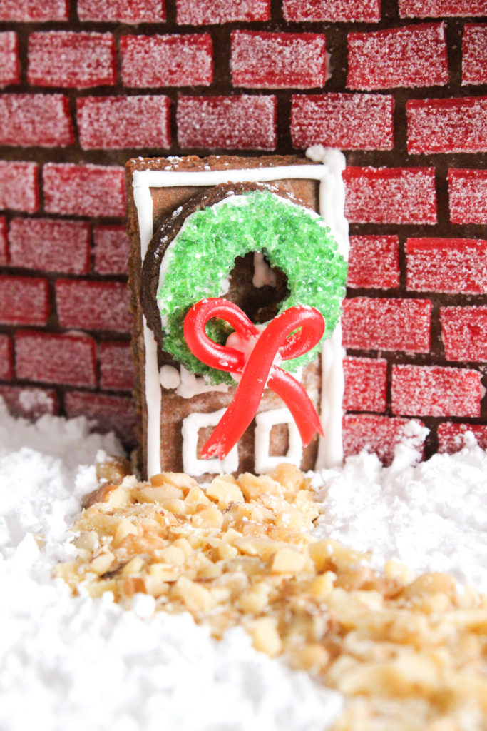 Close up view of front door on a gingerbread house.