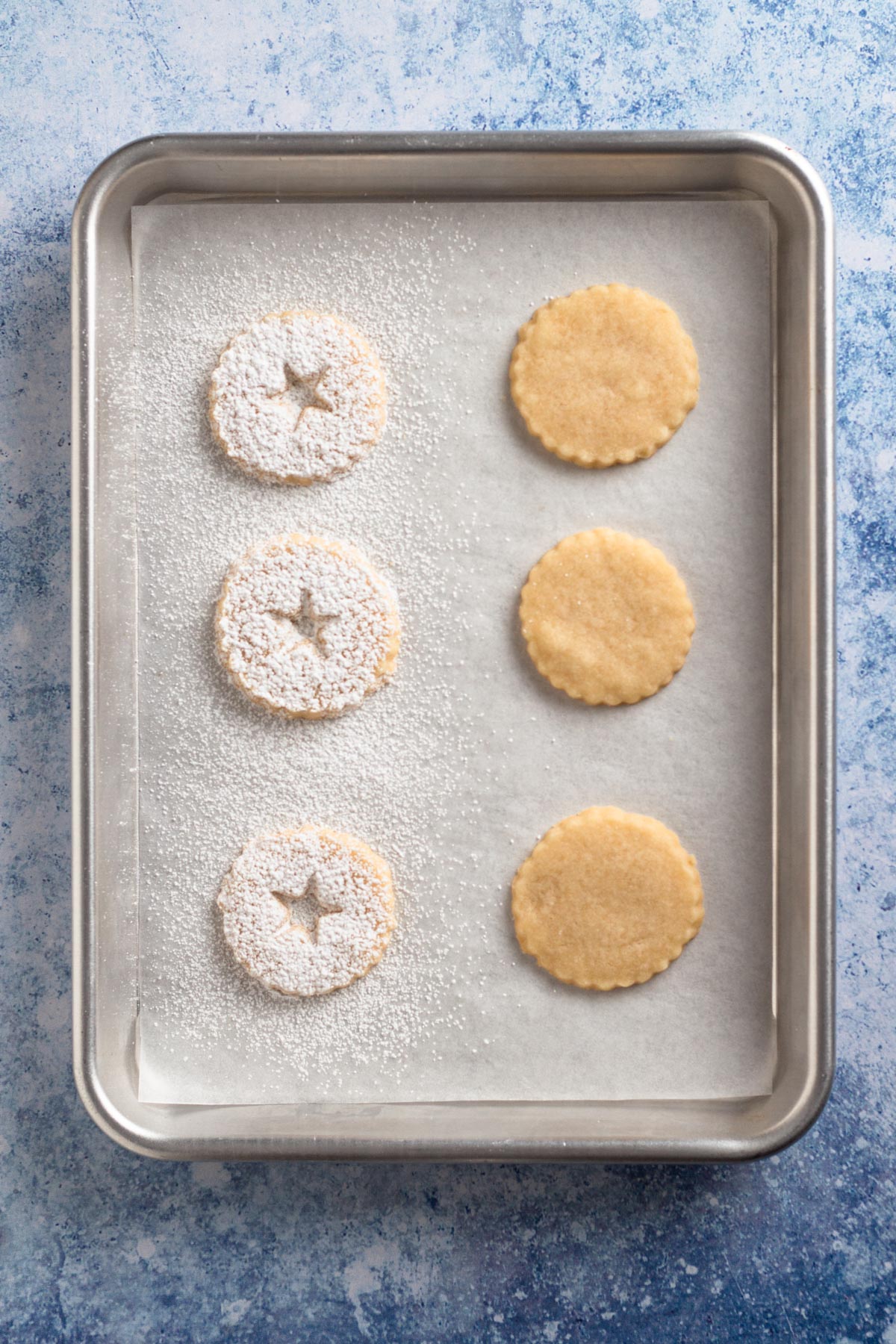 Overhead view of sugar-dusted shortbread cookies.