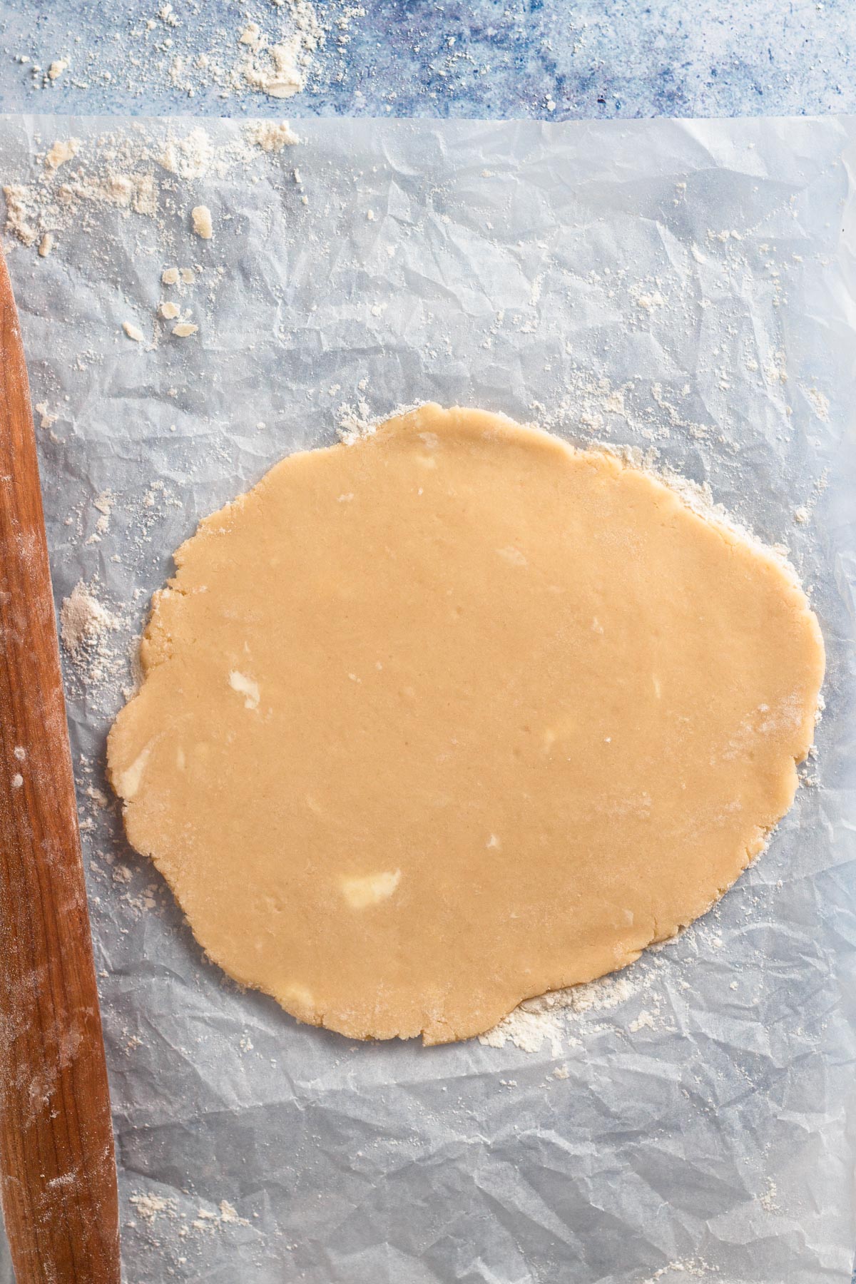 Overhead view of rolled out cookie dough.