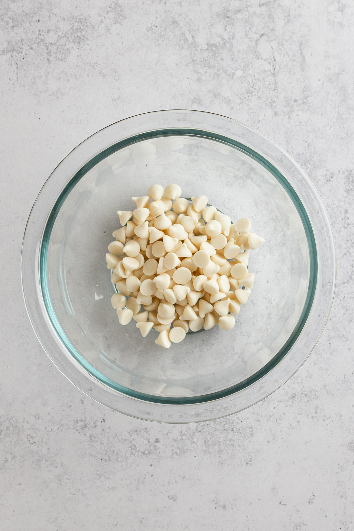white chocolate chips in a glass bowl