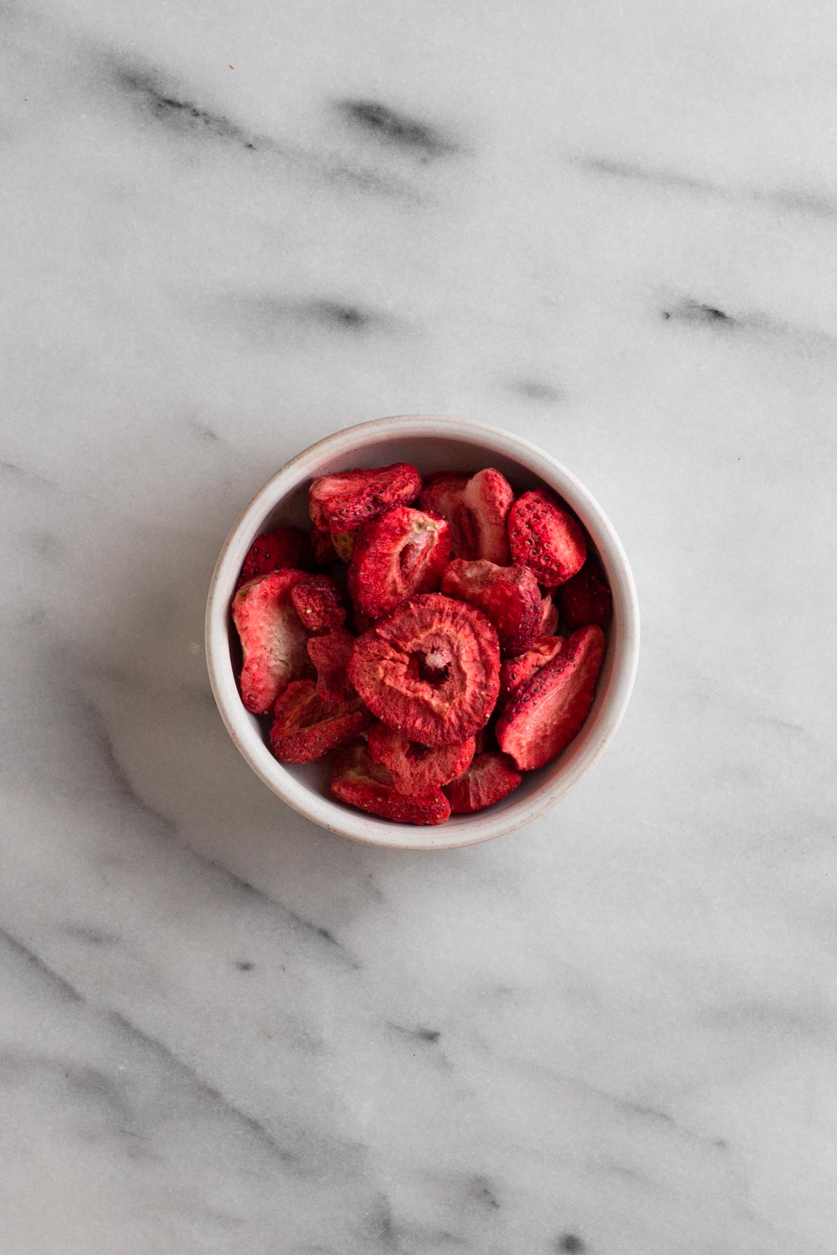 freeze-dried strawberries in a white dish