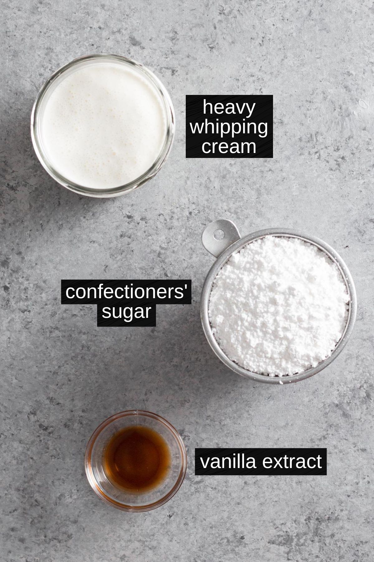 Recipe ingredients with labels on a gray surface.