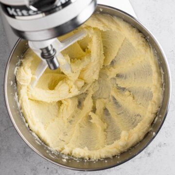 Creamed butter and sugar in the bowl of a stand mixer with the paddle attachment.