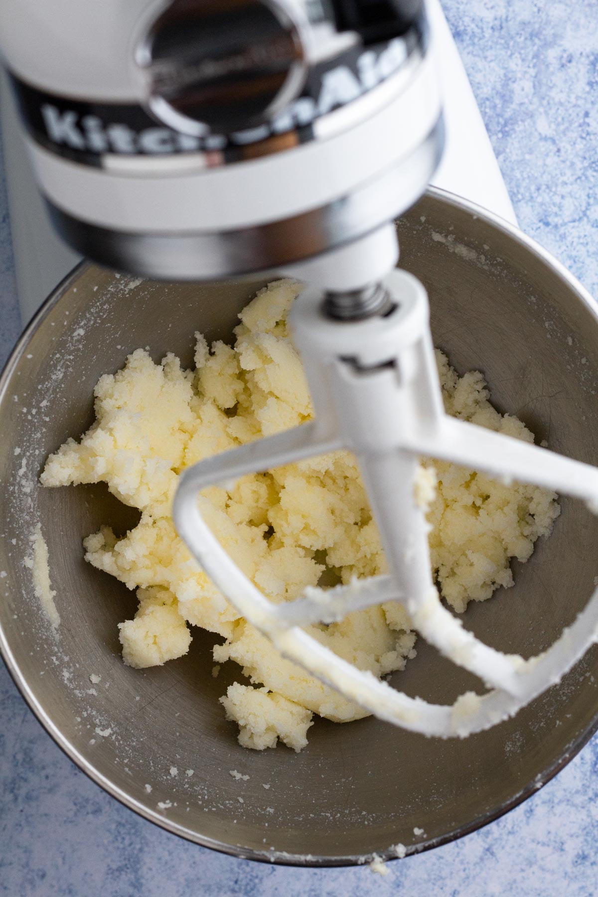 Creamed butter and sugar in the bowl of a stand mixer.