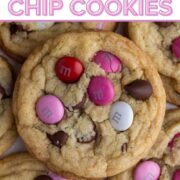 Stacked cookies with red, white, and pink M&Ms and chocolate chips and a text overlay.