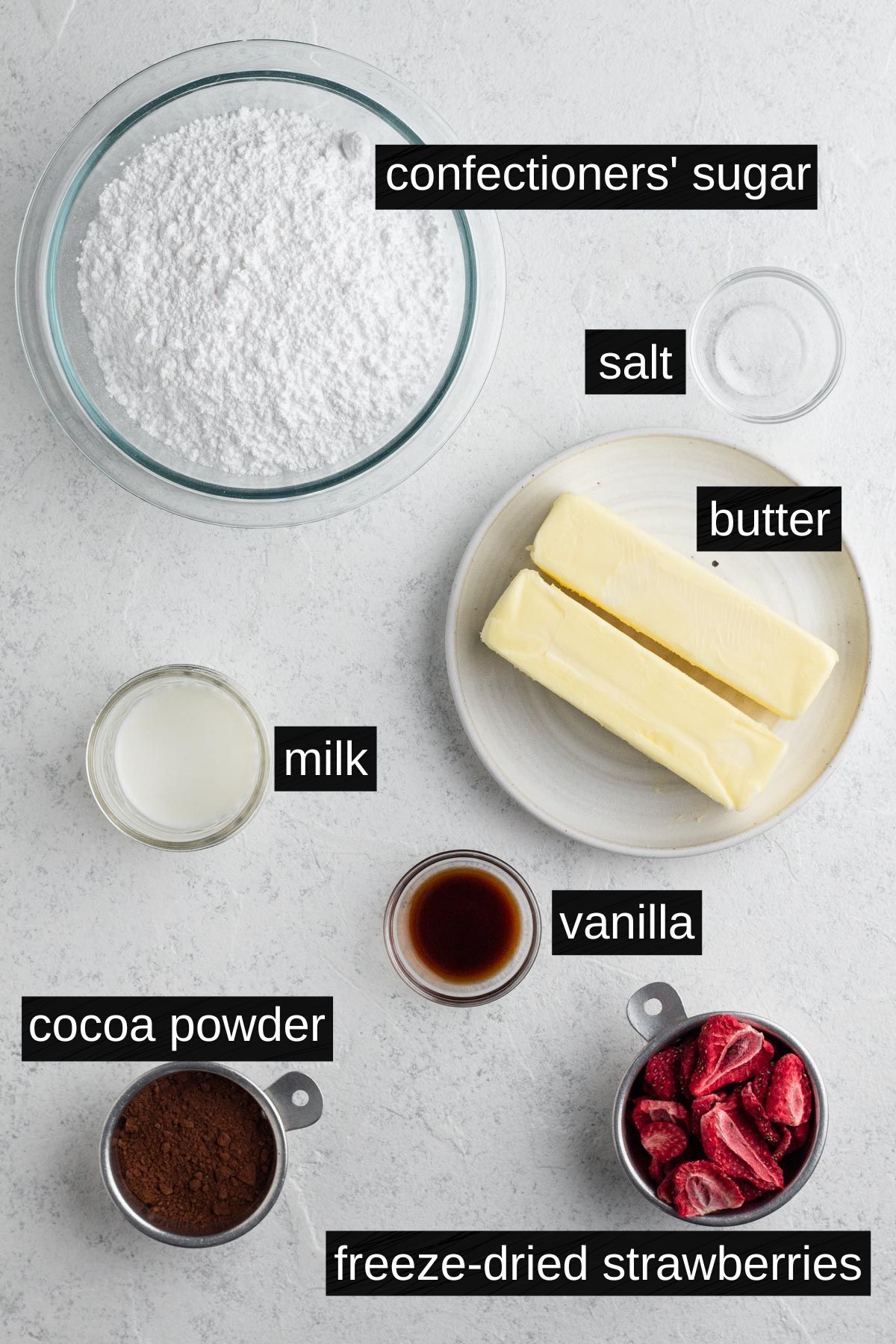 Frosting ingredients with labels on a white background.