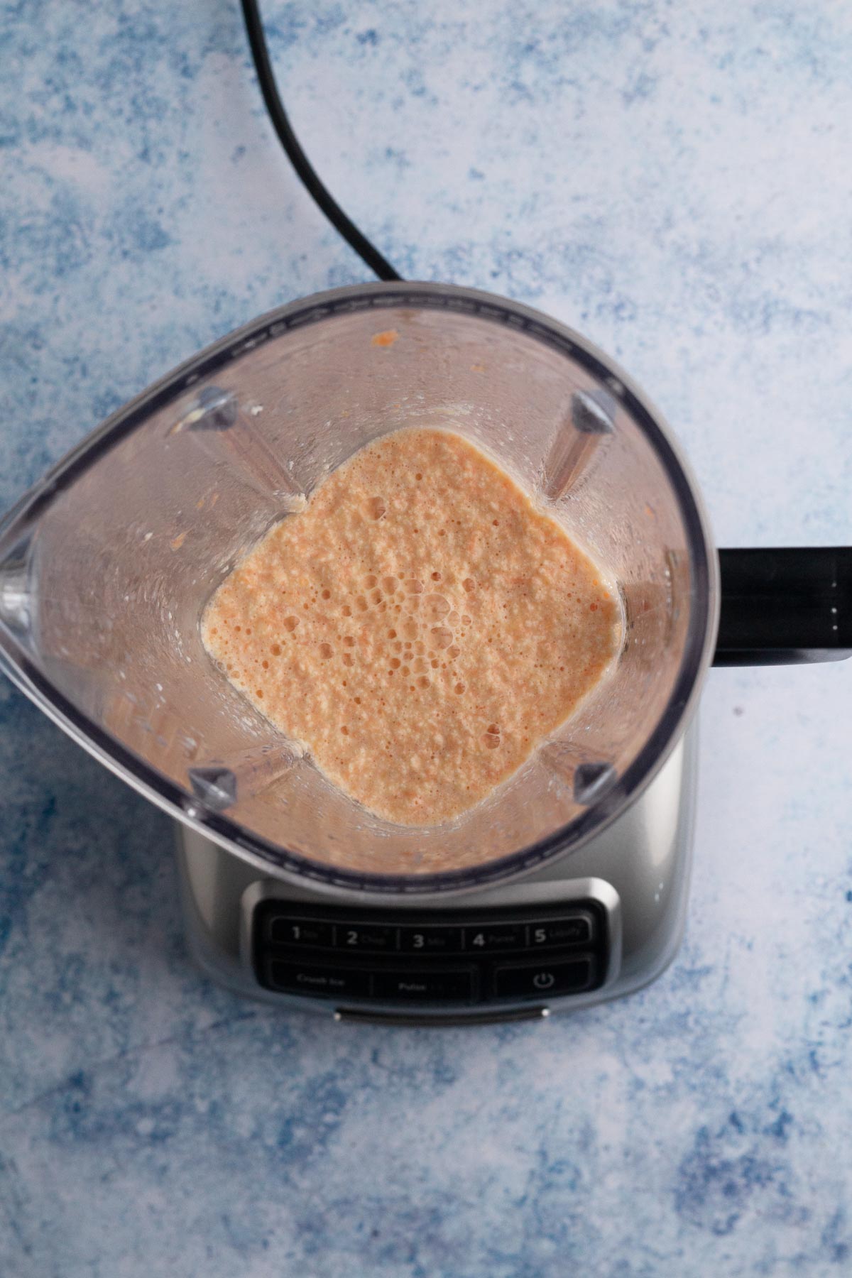 Wet ingredients blended together in a blender.
