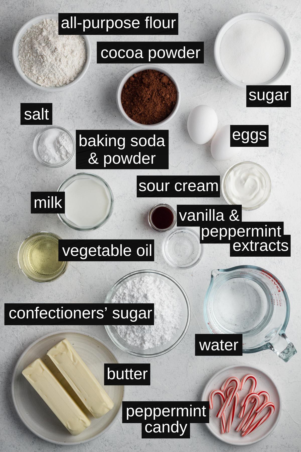 Recipe ingredients with labels on a white surface.