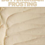 Close-up view of eggnog frosting spread over the top of a cake with a text overlay.