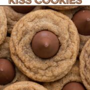 Overhead view of stacked cookie butter kiss cookies with a text overlay.
