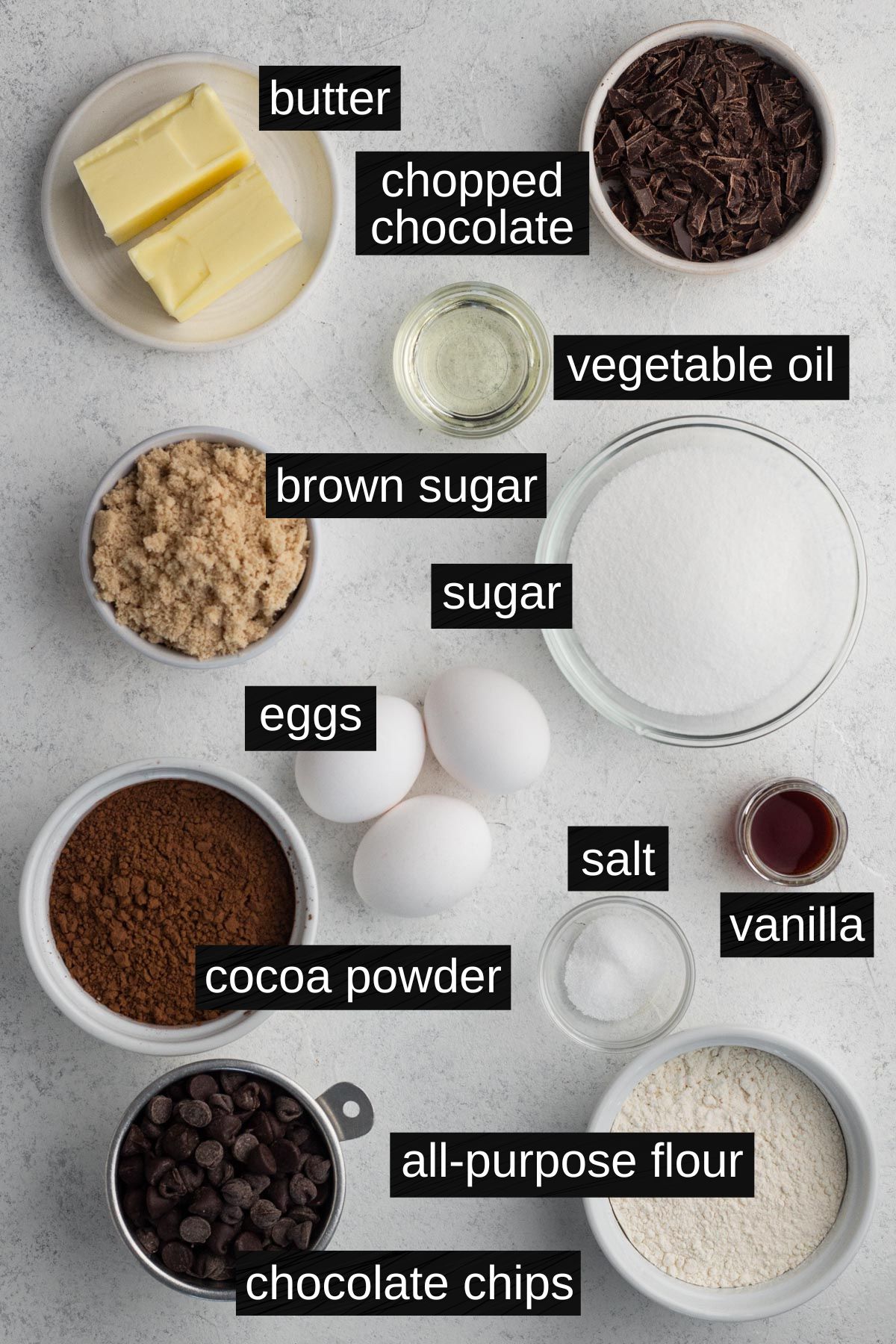 Recipe ingredients with labels on a white surface.