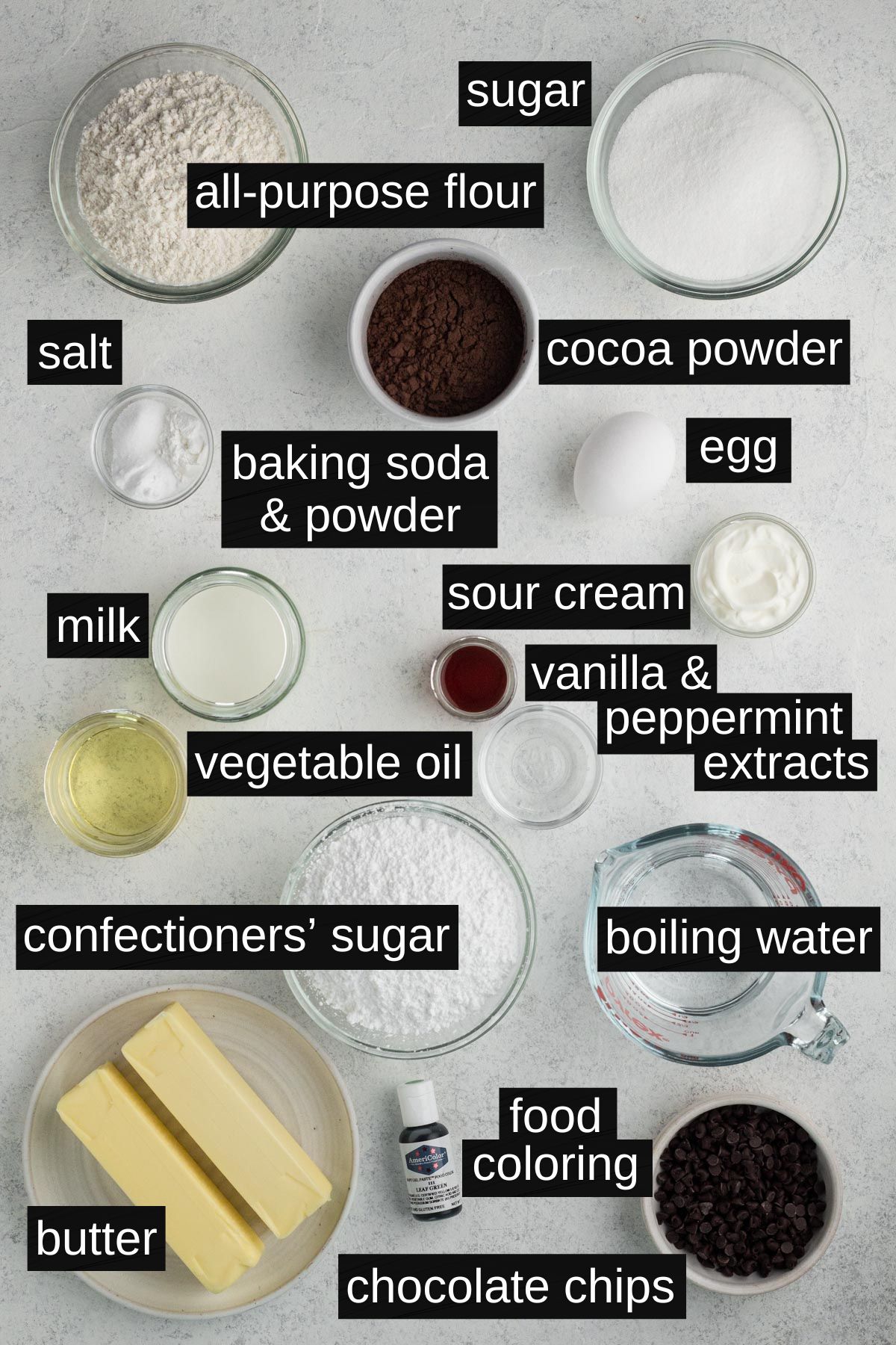 Recipe ingredients with labels on a white surface.