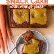 Overhead view of a square slices of carrot cake with a text overlay.