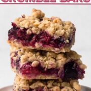 A stack of berry-filled crumble bars with a text overlay.