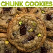 Cookies with bits of chocolate and chopped pistachios stacked on top of each other with a text overlay.