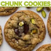 Cookies with bits of chocolate and chopped pistachios on a white surface with a text overlay.